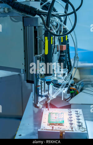 soldering iron tips of automated manufacturing soldering and assembly pcb board Stock Photo