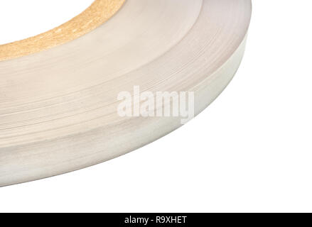 Part of round coil metal tape on white background close-up Stock Photo