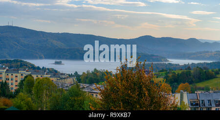Polanczyk, Bieszczady Mountains. Poland: Sun rising over mountains. Views from near hill. In background Solina Lake. Stock Photo