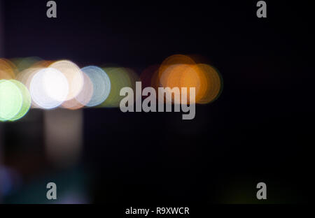 Colorful defocused lights blurred for editing with a black background. Stock Photo
