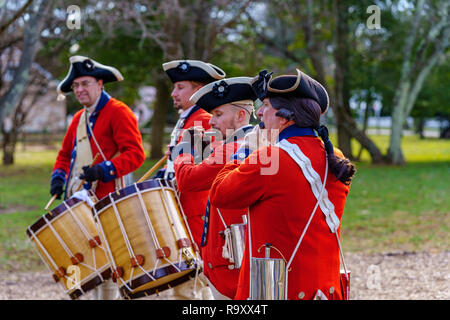 Washington Crossing, PA, USA - December 25, 2018: Reenactors prepare a cannon on Christmas to commemorate General George Washington’s crossing the Del Stock Photo