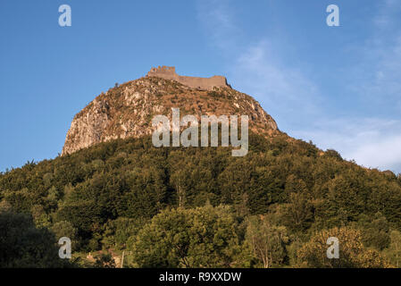 Ruins of the medieval Château de Montségur castle on hilltop at sunset, stronghold of the Cathars in the Ariège department, Occitanie, France Stock Photo