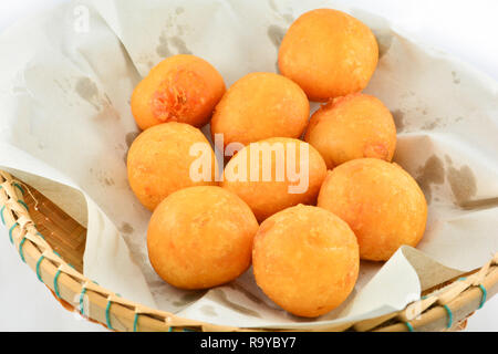 Thai Fried Sweet Potato Balls / general desserts for Snack in basket on white background Stock Photo