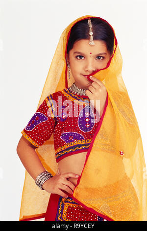 portrait of a young girl from gujarat in traditional costume called ghaghara choli r9ycey