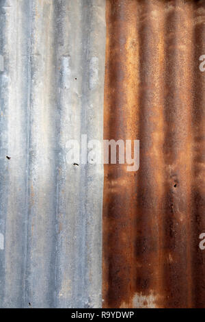 Close up old  rusty galvanized zinc sheet background. Stock Photo