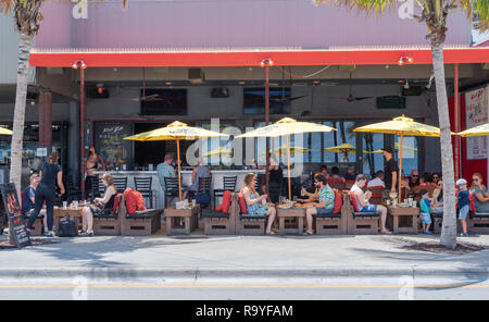 Fort Lauderdale, FL, USA -- May 1, 2018. Outdoor dining at casual beach restaurant in Fort Lauderdale Florida. Editorial Use Only. Stock Photo