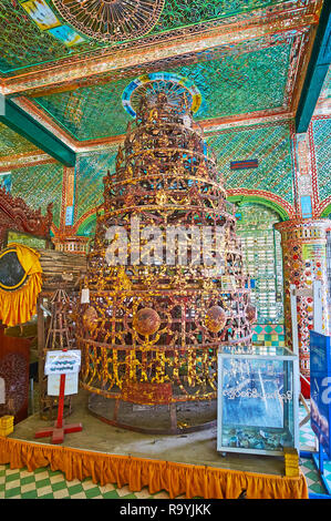 SAGAING, MYANMAR - FEBRUARY 21, 2018: The vintage hti umbrella from the stupa's top in temple of Soon Oo Ponya Shin Paya (Summit Pagoda), on February  Stock Photo