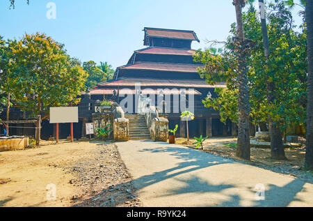 Historic Bagaya Monastery is one of the central landmarks of Ava (Inwa), famous for its stunning architecture and ornate wooden decorations, Myanmar. Stock Photo