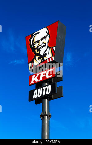 Sign for KFC drive thru against blue sky (Castellon de la Plana, Spain) Stock Photo