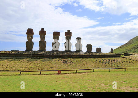 Seven Moai Statues of Ahu Nau Nau with Single Moai of Ahu Ature Huki in Backdrop, Anakena Beach, Easter Island, Chile Stock Photo