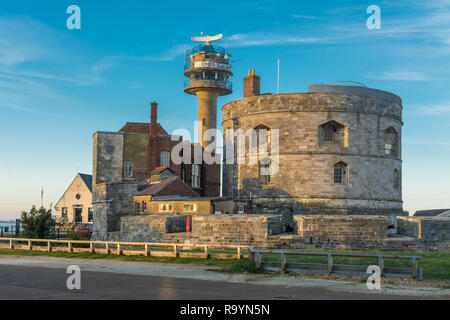 Calshot Castle, an artillery fort constructed by Henry VIII on the Calshot Spit, and coastguard tower, Hampshire, UK. Landmark, heritage, historic. Stock Photo