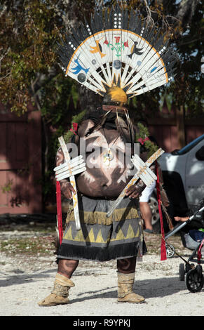 A White Mountain Apache Crown dancer, dances at the 2018 Miccosukee Arts & Crafts Festival at the Miccosukee Indian Village in South Florida on December29, 2018. Stock Photo