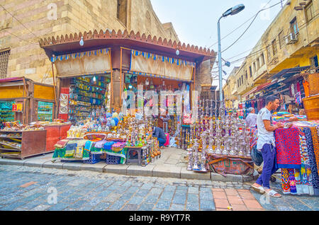 CAIRO, EGYPT - DECEMBER 20, 2017: The shisha stall with bright silver, multicolored shishas and useful accessories for them at Khan El-Khalili Market, Stock Photo