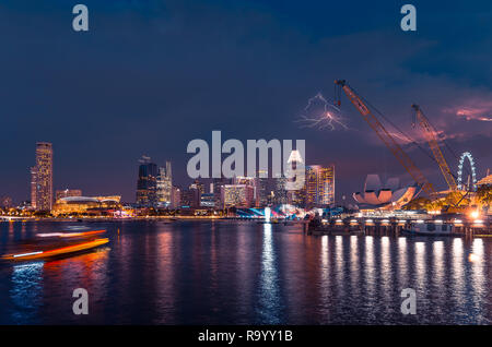 A sudden lightning storm that left just as quickly as it came. Just a normal day in tropical Singapore. Stock Photo