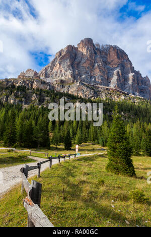 Hiking in amazing rocks of Dolomite mountains in Italy Stock Photo - Alamy