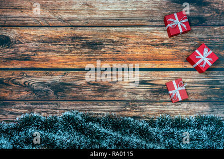 Christmas background with three red Christmas boxes Stock Photo