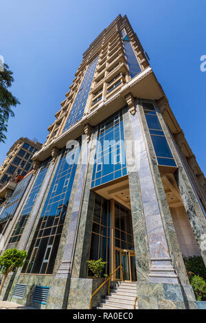 Exterior of the luxurious 5 star Cairo At The First Residence Four Seasons Hotel and First Mall, Giza, Cairo, Egypt on a sunny day with blue sky