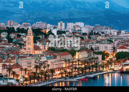Amazing Split city waterfront panorama at blue hour, Dalmatia, Europe. Roman Palace of the Emperor Diocletian and tower of Saint Domnius cathedral. Sp