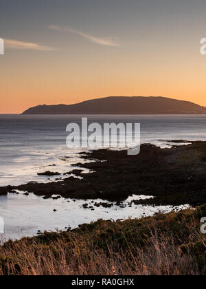 View over Finisterre from Cape Cee at sunset, Galicia, Spain Stock Photo