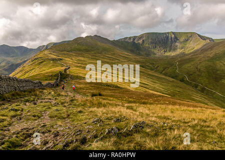 View on the track up to Striding Edge and Helvellyn in th Lake District National Park in Cumbria, England. Stock Photo