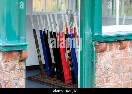 Close up on a set of colourful railway signal box control levers Stock Photo