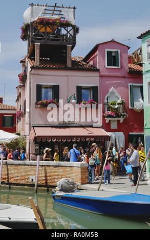 The Riva Rosa Ristorante is a popular venue on the Venetian island of Burano. Stock Photo