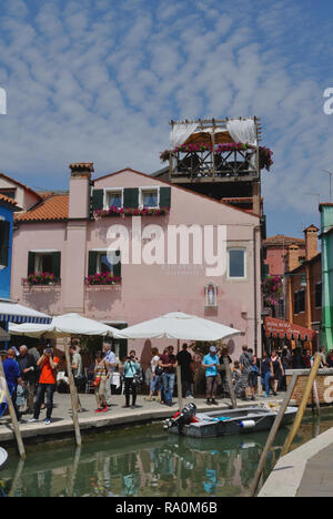 The Riva Rosa Ristorante is a popular venue on the Venetian island of Burano. Stock Photo