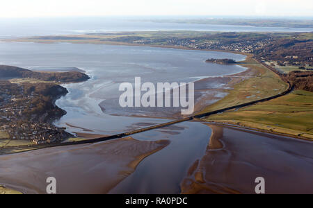 aerial view of the railway line at Arnside, Lancashire as it crosses the River Kent Estuary coming down from Kendal Stock Photo