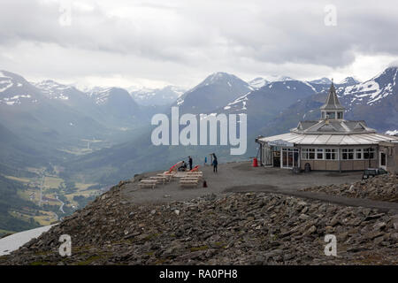 Fjords, Norway - June 5th 2018 - Tourist in a restaurant in the top of the fjords in Norway in a fog day Stock Photo