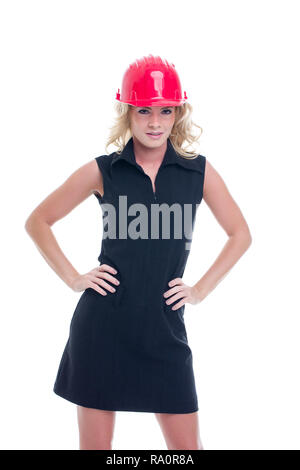 Young construction manager woman posing, isolated on white background Stock Photo