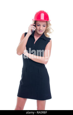 Happy young construction manager woman calling, isolated on white background Stock Photo