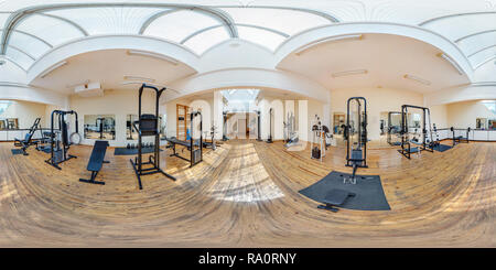 360 degree panoramic view of GRODNO, BELARUS - JULY 10, 2013: Panorama in interior gym with exercise machines.  Full 360 by 180 degree seamless spherical panorama in equirectangul
