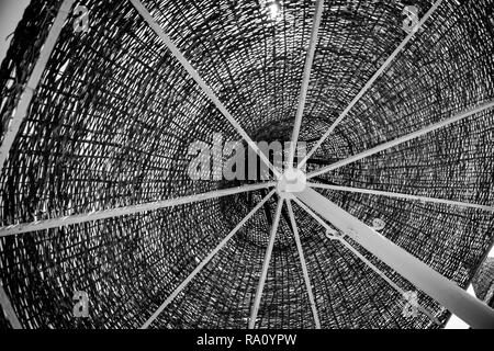 monochrome black and white of wooden beach umbrella Stock Photo