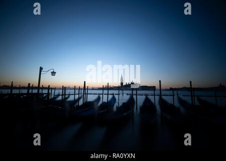 Dawn over the gondolas, Venice, Italy. Stock Photo