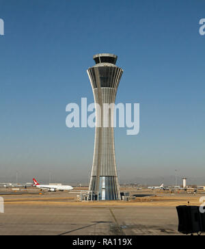 Beijing Capital International Airport, China and passing the control tower at Terminal 3. Stock Photo