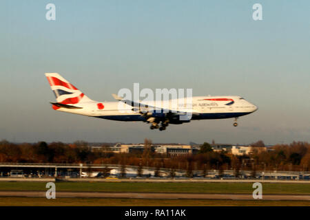 speeding BA Jumbo jet coming in to land at Heathrow airport UK. Boeing 747-400 Stock Photo
