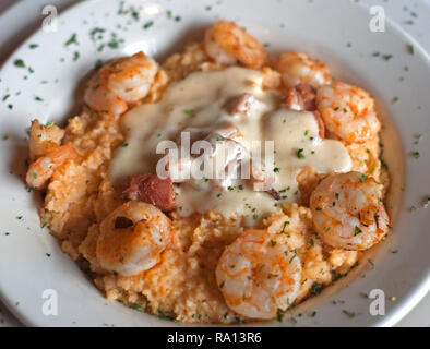 Fresh Gulf shrimp is served atop a bed of cheese grits at Weidmann's Restaurant on Jan. 16, 2011 in Meridian, Mississippi. Stock Photo