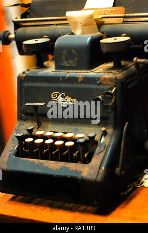 A vintage Dalton cash register sits on a desk Jan. 9, 2011 at the Antique Mall of Meridian in Meridian, Mississippi. Stock Photo