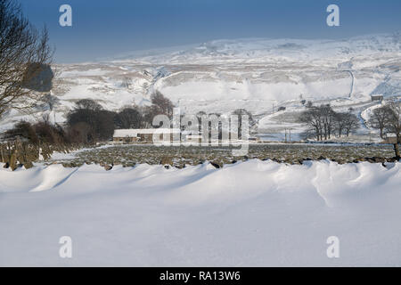 House cut off by snowdrifts after a bad snow storm, Kirkby Stephen, Cumbria. Stock Photo