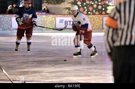 Moscow, Russia. 29th December 2018. Russian President Vladimir Putin #11, right, during ice hockey action at the Night Hockey League match in the rink at the GUM Department store in Red Square December 29, 2018 in Moscow, Russia. Credit: Planetpix/Alamy Live News