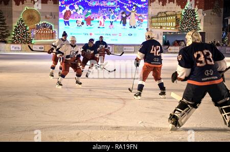 Moscow, Russia. 29th December 2018. Russian President Vladimir Putin #11, left, during ice hockey action at the Night Hockey League match in the rink at the GUM Department store in Red Square December 29, 2018 in Moscow, Russia. Credit: Planetpix/Alamy Live News