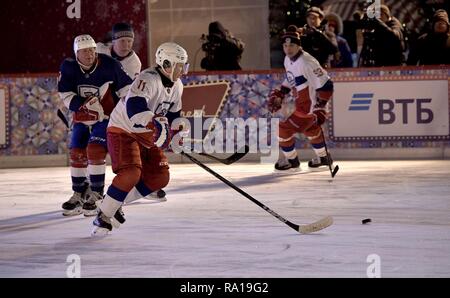 Moscow, Russia. 29th December 2018. Russian President Vladimir Putin #11, during ice hockey action at the Night Hockey League match in the rink at the GUM Department store in Red Square December 29, 2018 in Moscow, Russia. Credit: Planetpix/Alamy Live News