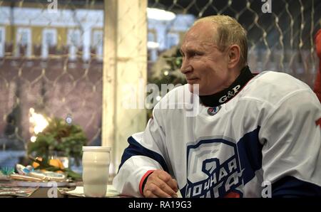 Moscow, Russia. 29th December 2018. Russian President Vladimir Putin following the Night Hockey League match in the rink at the GUM Department store in Red Square December 29, 2018 in Moscow, Russia. Credit: Planetpix/Alamy Live News