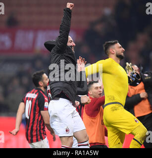 Milan, Italy. 29th Dec, 2018. Ac Milan's Gonzalo Higuain (front) celebrates at the end of the Serie A soccer match between AC Milan and Spal in Milan, Italy, Dec. 29, 2018. AC Milan won 2-1. Credit: Alberto Lingria/Xinhua/Alamy Live News Stock Photo