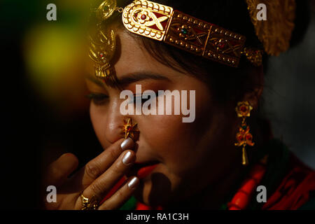 Kathmandu, Nepal. 30th Dec, 2018. A girl from Gurung community dressed in traditional attire takes part in a parade to celebrate Tamu Lhosar festival in Kathmandu, Nepal, Nepal on Dec. 30, 2018. Credit: Sulav Shrestha/Xinhua/Alamy Live News Stock Photo