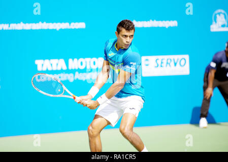 Pune, India. 30th December 2018. Thiago Monteiro of Brazil in action in the final round of qualifying singles competition at Tata Open Maharashtra ATP Tennis tournament in Pune, India. Credit: Karunesh Johri/Alamy Live News Stock Photo