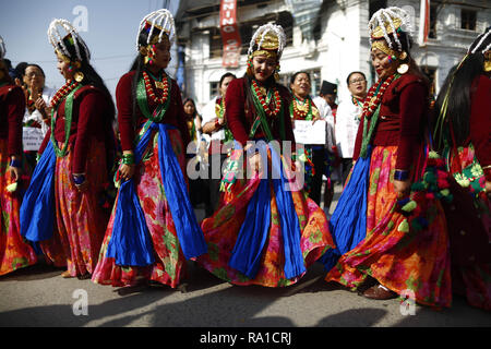 Kathmandu, Nepal. 30th Dec, 2018. Women from the Gurung community dance and sing during a rally to celebrate Tamu Lhosar festival as their new year in Kathmandu, Nepal on Sunday, December 30, 2018. This year is the year of deer. (Credit Image: © Skanda Gautam/ZUMA Wire) Credit: ZUMA Press, Inc./Alamy Live News Stock Photo