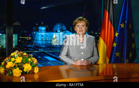 Berlin, Germany. 30th Dec, 2018. Embargoed period: 31 December 2018, 00:00 - Federal Chancellor Angela Merkel (CDU), recorded after the recording of her New Year's address at the Chancellery. Credit: John Macdougall/AFP POOL/dpa/Alamy Live News Stock Photo