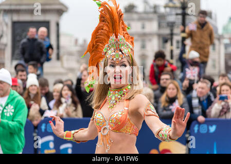 London, UK.  30 December 2018  Some of London New Year Day Parade’s best performers kick-starting festivities in front of the World famous National Gallery, Trafalgar Square, London, UK. Acts include The London School of Samba, which have been helping people to experience Brazilian Carnival culture since 1984.  Credit: Ilyas Ayub / Alamy Live News