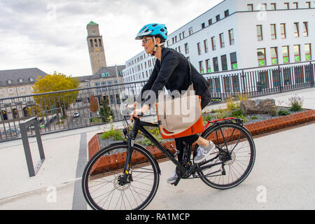 Fast cycling track, Radschnellweg RS1, in MŸlheim an der Ruhr, Germany, on a former railway viaduct, in the middle of the city center, commuter, with 